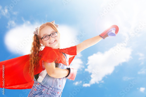Fancy superhero girl with b...