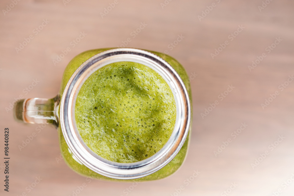 A green smoothie in a mason jar A green smoothie in a mason jar