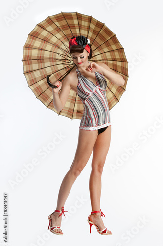 Pin-up woman with umbrella