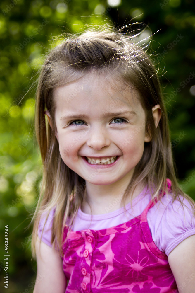 Germany, Bavaria, Portrait of girl smiling, close up Germany, Bavaria, Portrait of girl smiling, close up