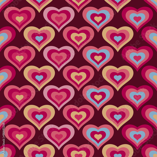 Seamless vector background with decorative hearts