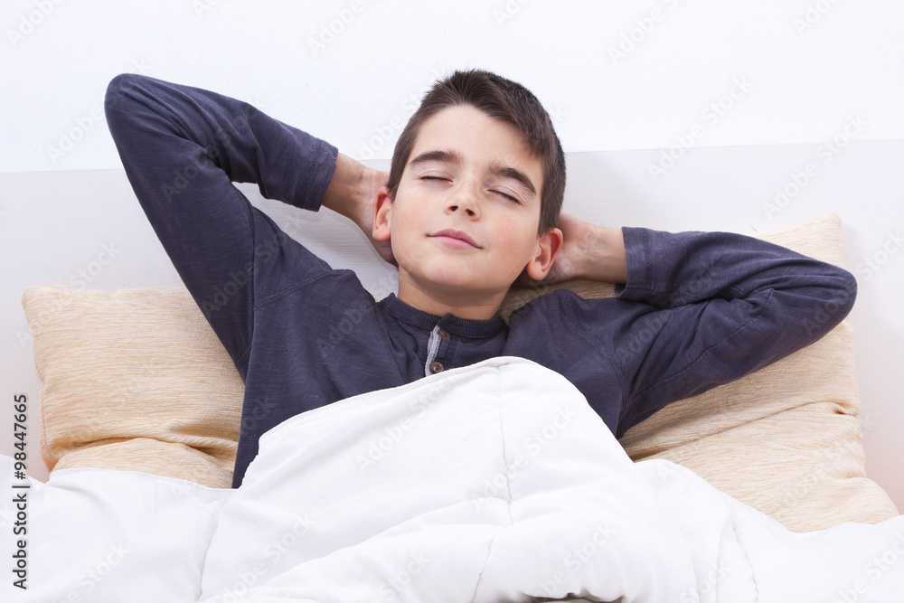 child lying in bed asleep child lying in bed asleep