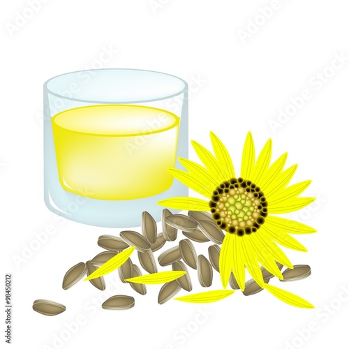 Glass of Sunflower Oil and Yellow Sunflower with Seed
