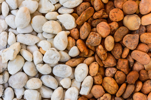 Lot of pebbles around big stone