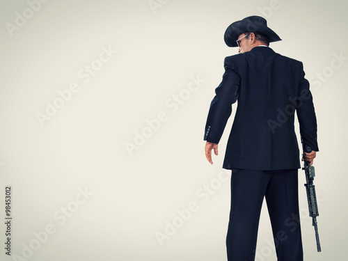 Western style hitman, with copy space