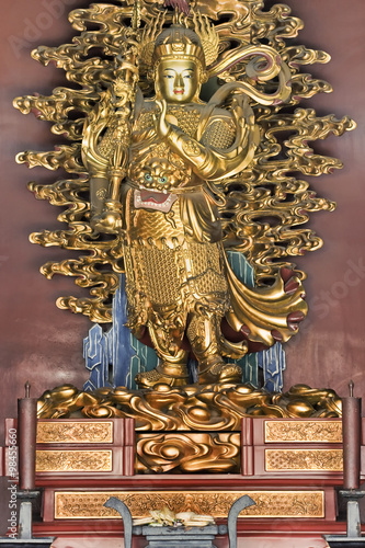 Golden statue on an altar at Lama Temple, Beijing