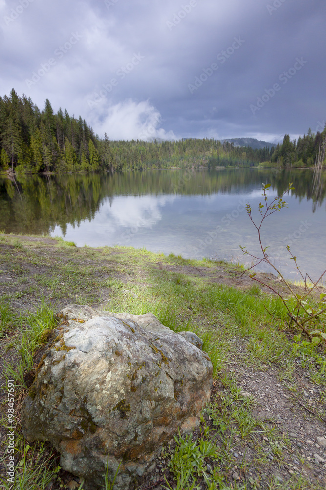 Scenic Reflections in Champion Lake, BC, Canada