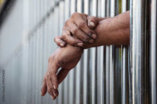 Photography hand in jail