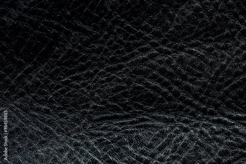 Closeup of seamless black leather texture