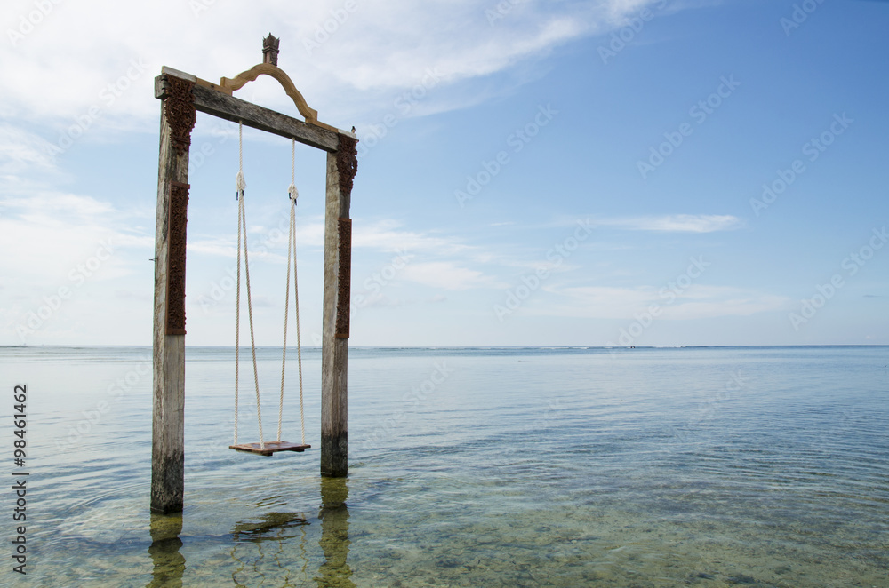 Swing in the ocean - stock image