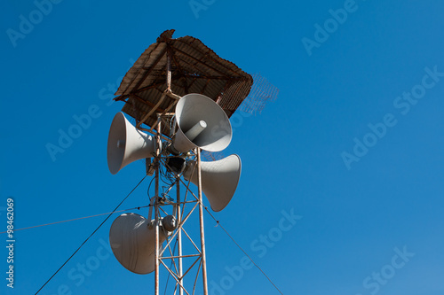 Loudspeakers broadcast ,Blue sky background photo