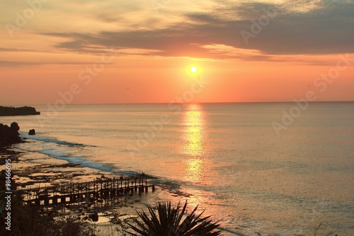 Sunset at jimbaran beach ,Bali Indonesia photo
