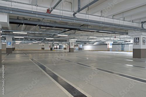 Garage, underground interior with empty parking lot of a supermarket 