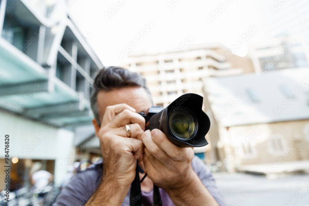 Male photographer taking picture Male photographer taking picture