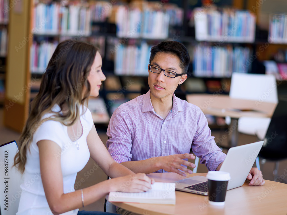 Two young students at the library Two young students at the library