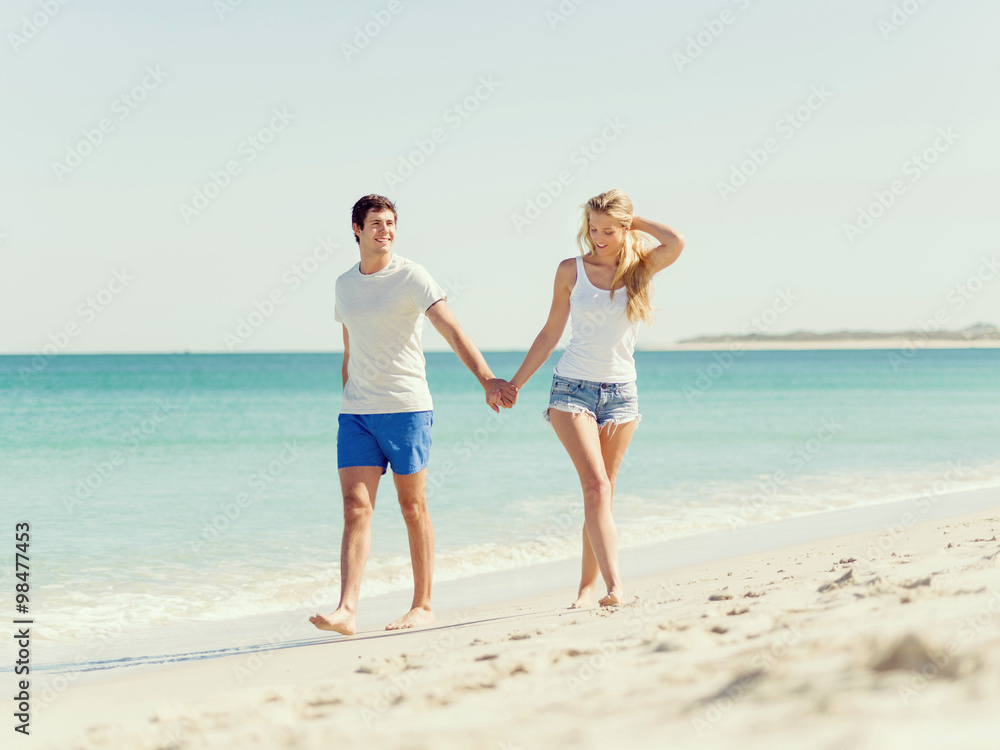 Romantic young couple on the beach