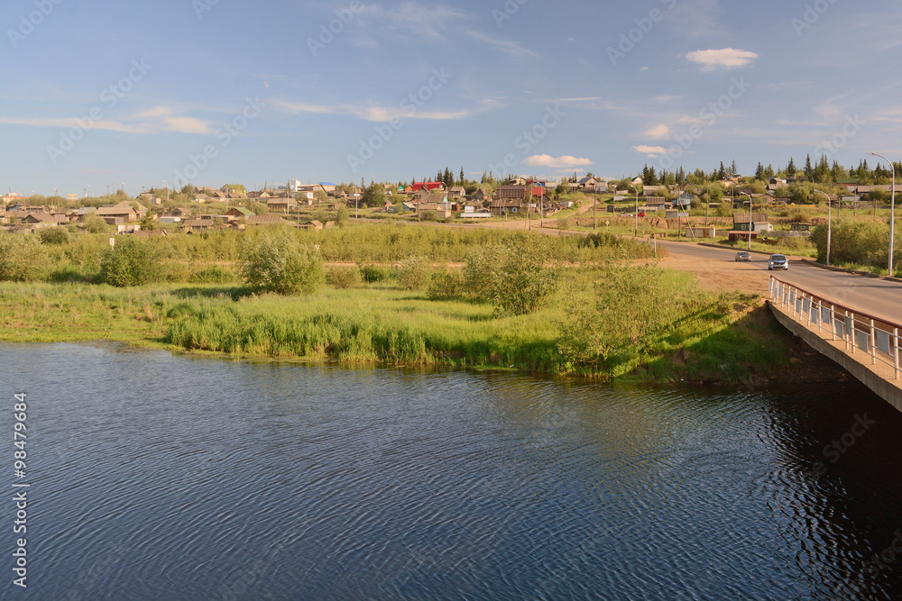 Rural area in the town of Mirny, Irelyakh bridge over the river. Rural area in the town of Mirny, Irelyakh bridge over the river.