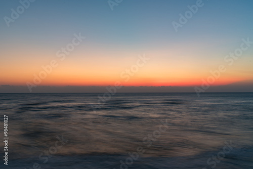 Colorful of sunrise on the ocean beach © mcvsn