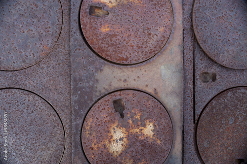 Series of round burner plates on pioneer, wood burning stove 