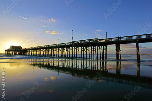 Beach pier winter afternoon sunset