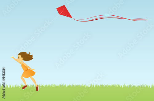 Girl running and flying a kite
