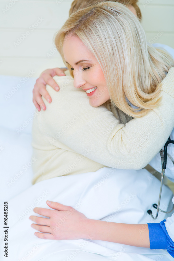 Professional nurse taking care of a patient Professional nurse taking care of a patient