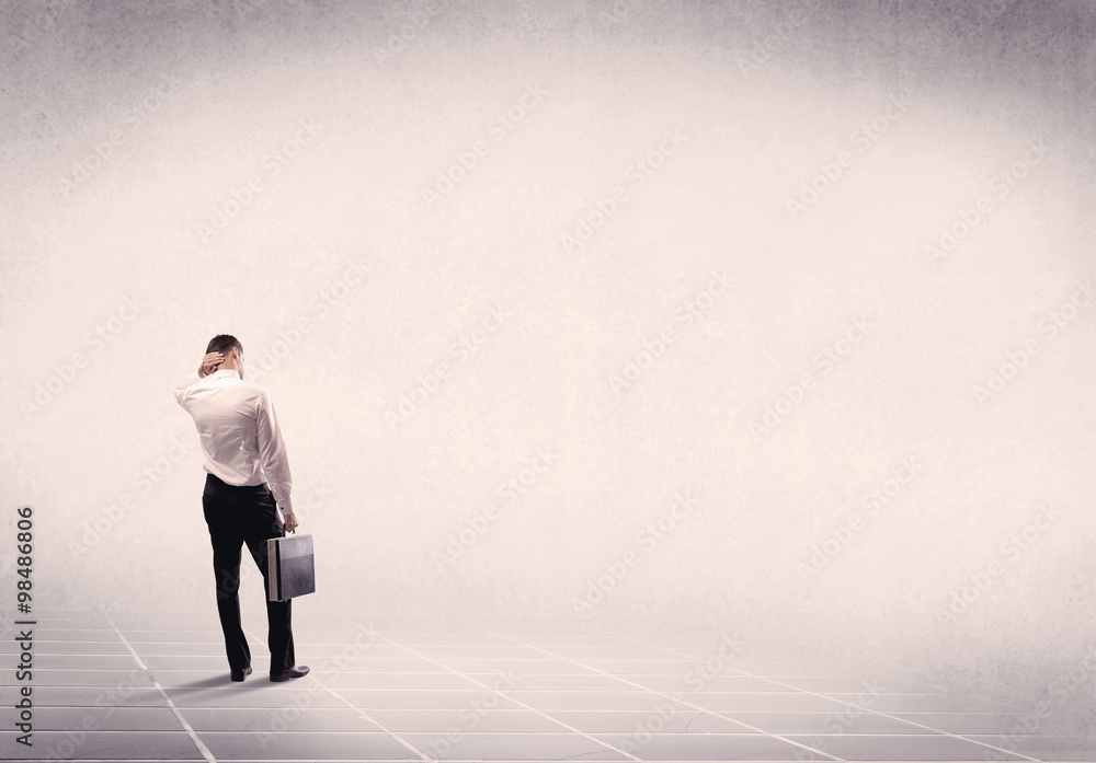Business person standing in empty space Business person standing in empty space