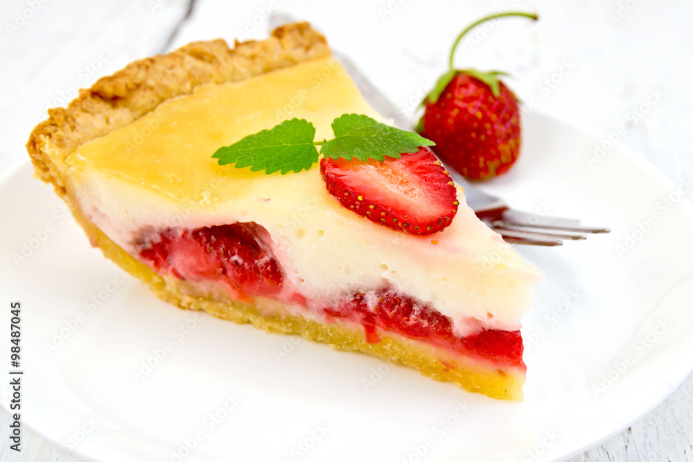 Pie strawberry with sour cream on light board Pie strawberry with sour cream on light board