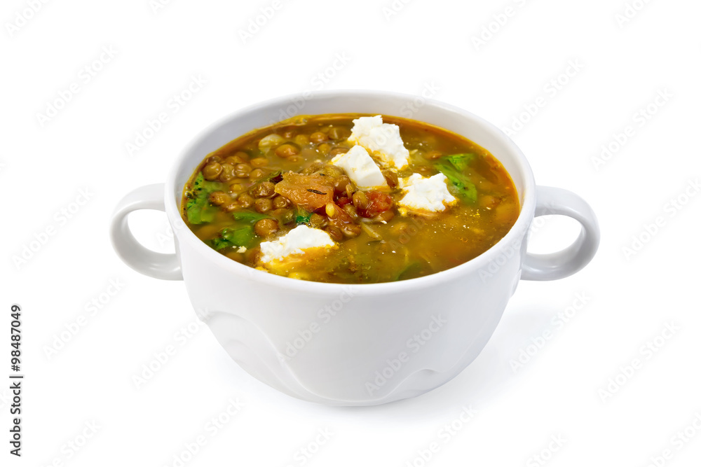 Soup lentil with spinach and cheese in white bowl Soup lentil with spinach and cheese in white bowl