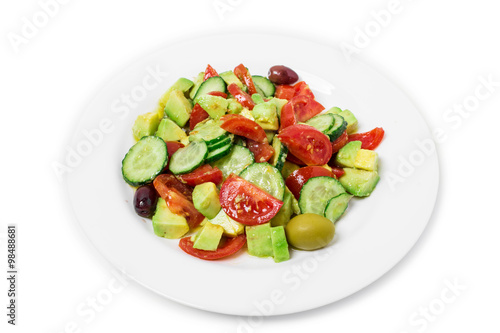 Fresh avocado salad with olives.