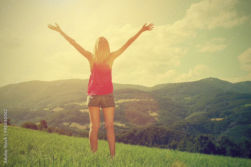 Girl enjoying in a countryside scenic. Girl enjoying in a countryside scenic.
