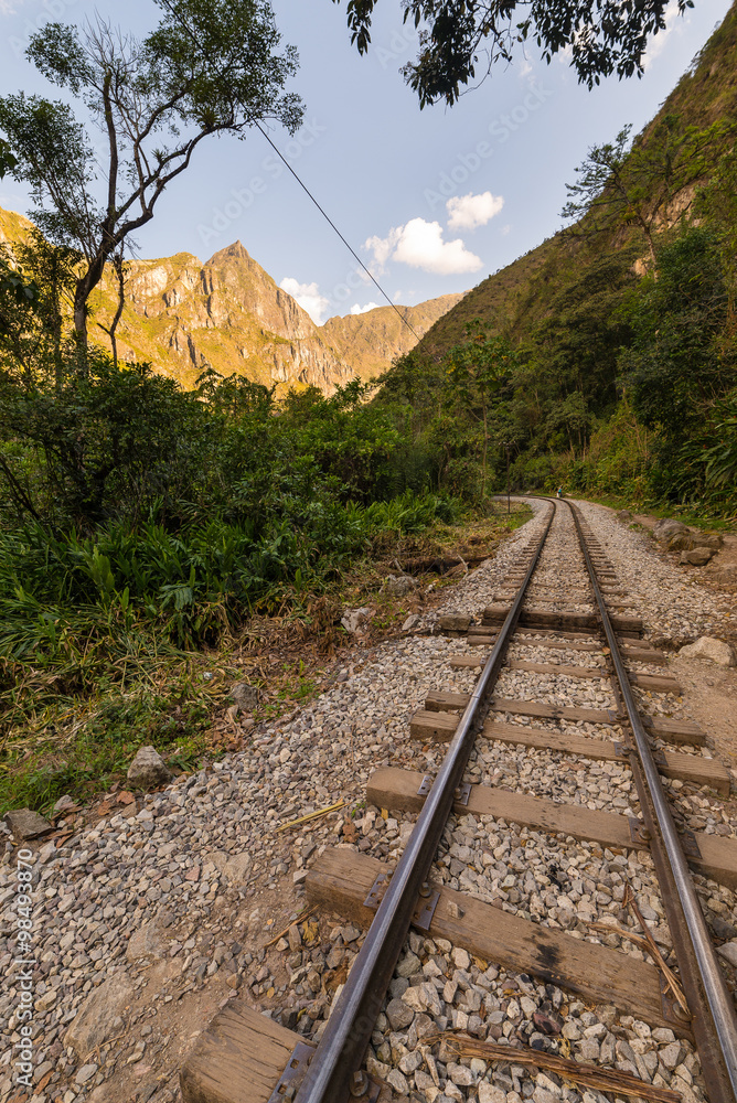 Railway track and Machu Picchu mountains, Peru