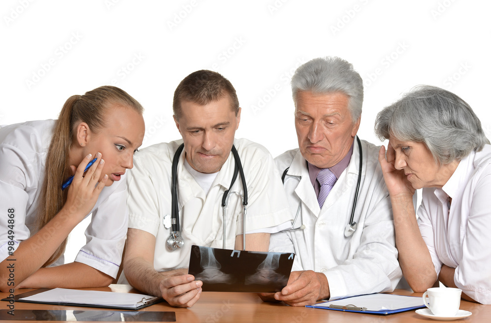 Doctors discussing at table