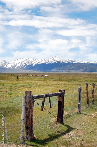 Sierra nevada snow mountains with farming fields
