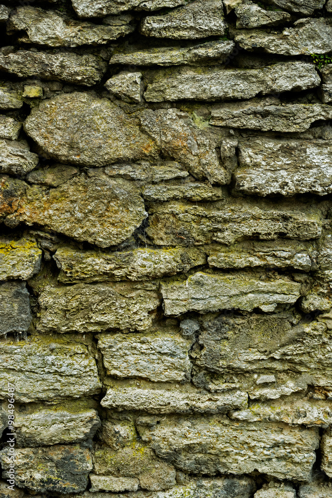 Background of old und ruined stone wall Background of old und ruined stone wall