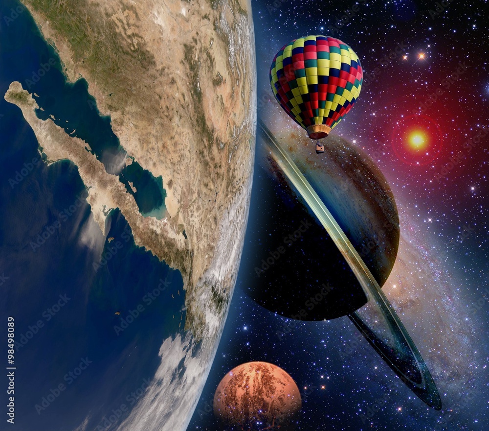 Hot air balloon surreal wonderland fairy tale landscape fantasy saturn planet. Elements of this image furnished by NASA.