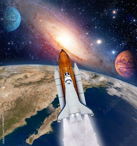 Fototapeta Naklejka Na Ścianę i Meble -  Shuttle rocket ship launch milky way galaxy mars planet solar system space. Elements of this image furnished by NASA.