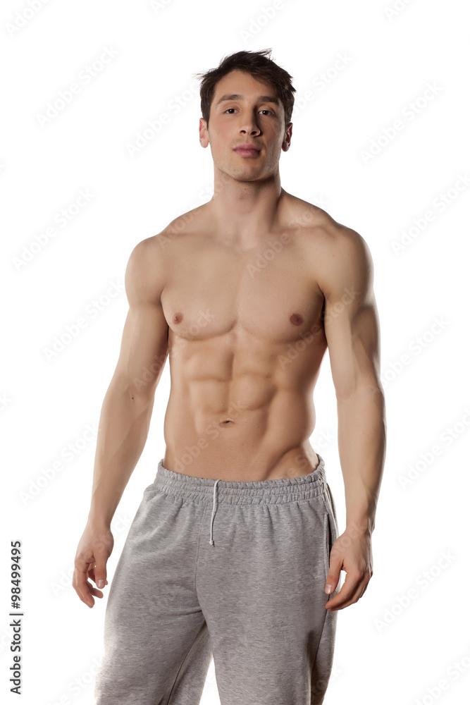half-naked muscular athlete man on white background