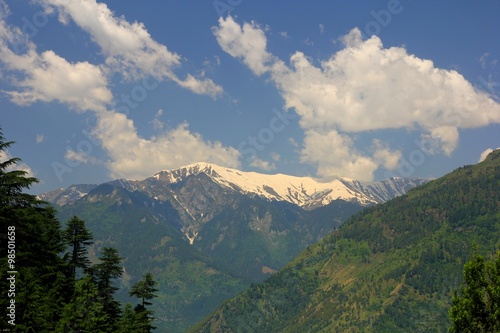 Blue sky with clouds background in mountains. Himalai, India photo