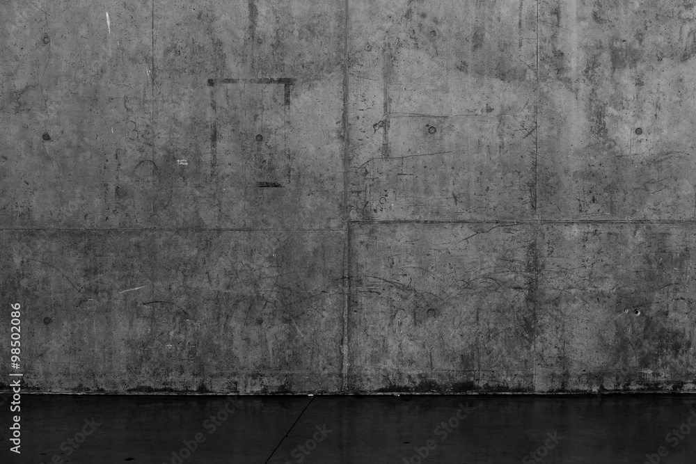 Grungy dark concrete wall and wet floor Grungy dark concrete wall and wet floor