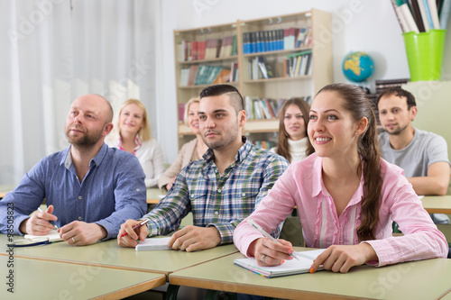 Photography Adult students writing in classroom