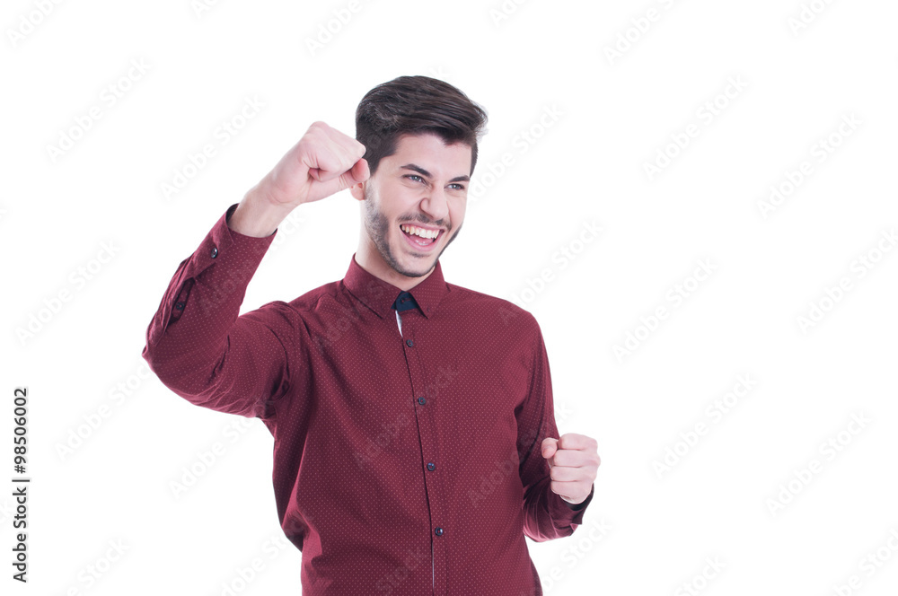 Successful young man celebrating his winning Successful young man celebrating his winning