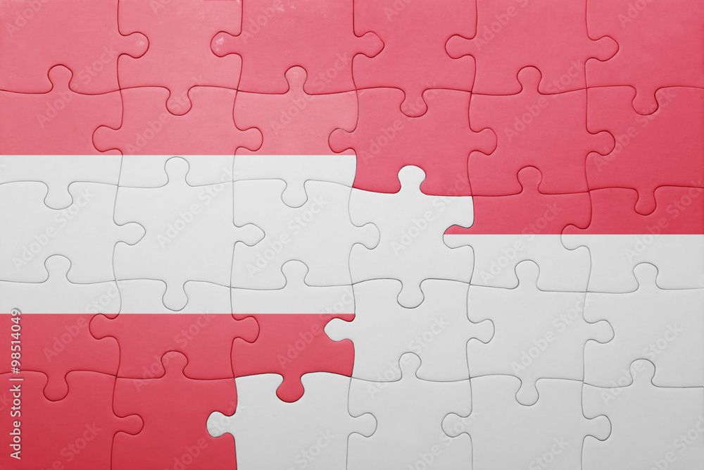 Fototapeta premium puzzle with the national flag of indonesia and austria