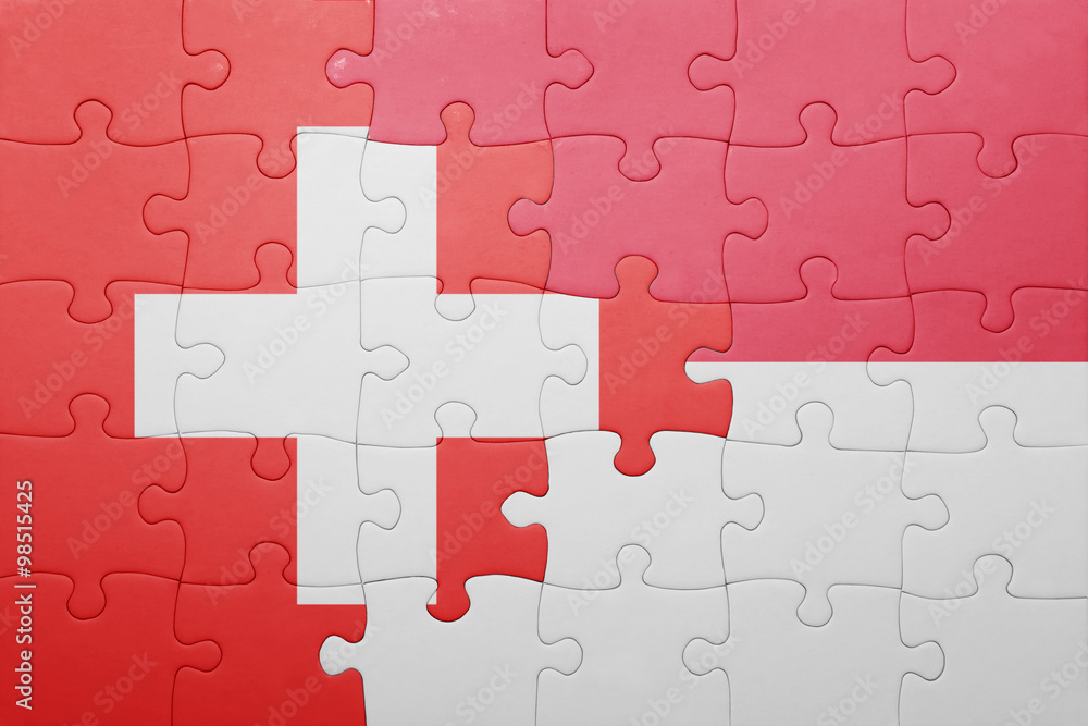 puzzle with the national flag of indonesia and switzerland puzzle with the national flag of indonesia and switzerland