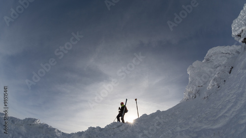 skier on a mountain ridge in the winter © catgrig