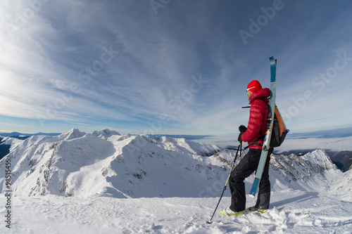 skier on top of the mountain