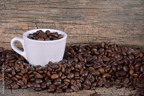 Coffee beans in a cup