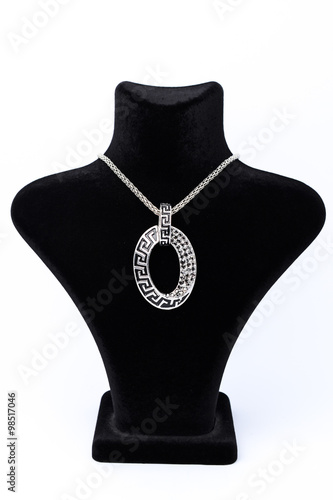 oval pendant on a mannequin isolated on white