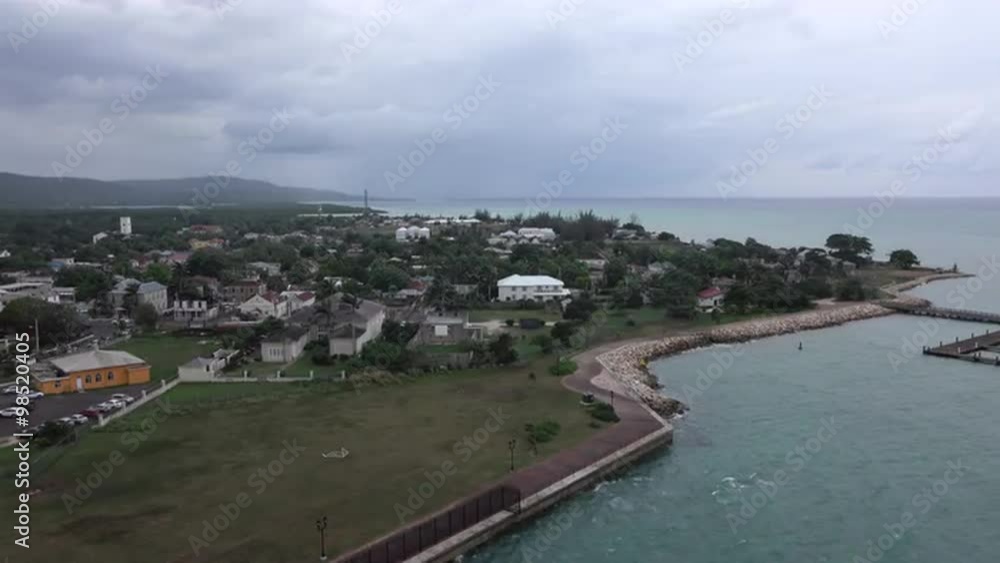 Falmouth Jamaica downtown Caribbean port overhead. Spanish rule after Christopher Columbus in 1494. Independence from United Kingdom 1962. 1.3 million tourists annually. Falmouth Jamaica downtown Caribbean port overhead. Spanish rule after Christopher Columbus in 1494. Independence from United Kingdom 1962. 1.3 million tourists annually.
