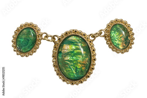brooch with green stones isolated on white
